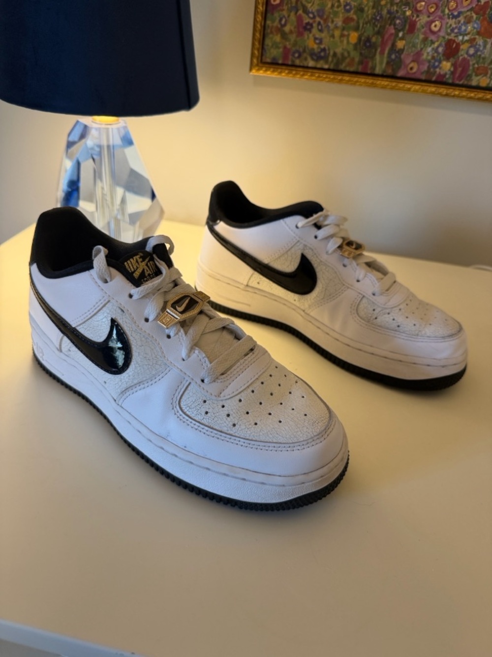 Nike White and Black Low-Top Sneakers with Gold Accent